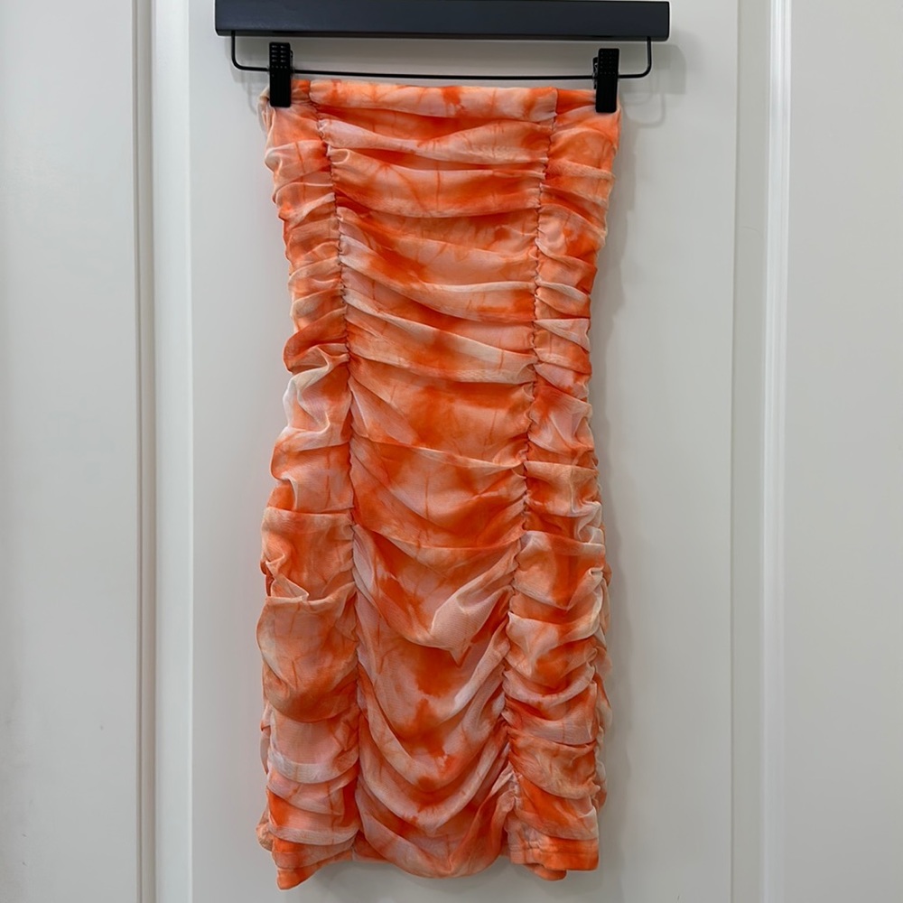 Orange strapless body con dress